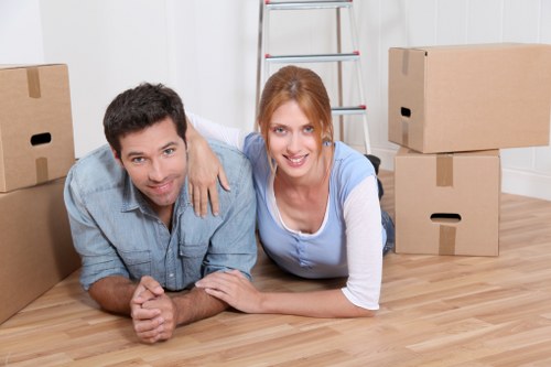 Professional movers handling furniture in Honoroak