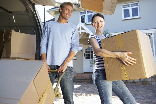 Warehouse worker moving goods with safe manual handling practices